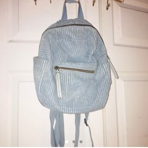Blue mini backpack.